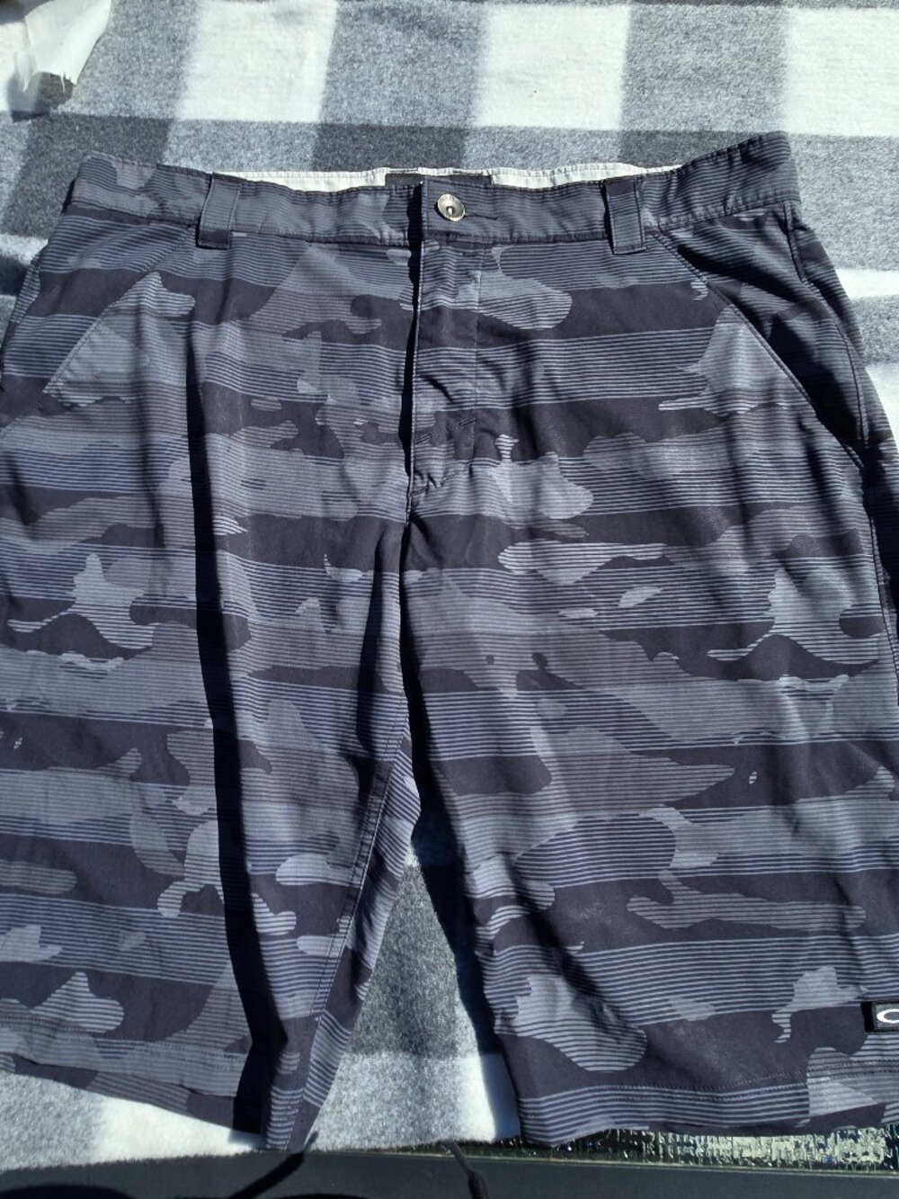 Men's Oakley shorts size 38, Gray and Black Camo pattern, VGUC